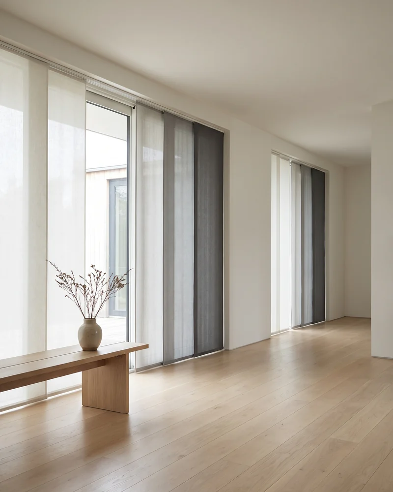 Blockout panel glide blinds across sliding doors