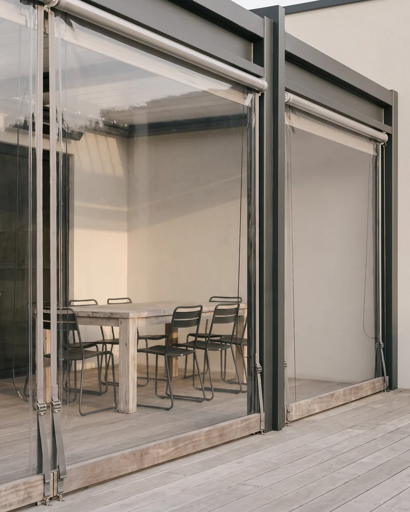 Café blinds enclosing an outdoor dining area