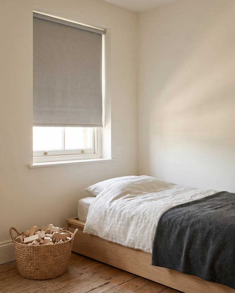 A cordless roller blind fitted in a child's room