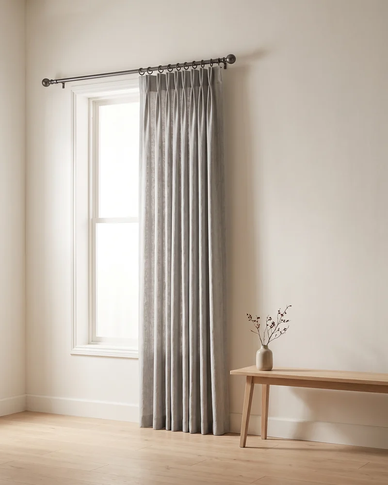 Curtains hung from a decorative rod