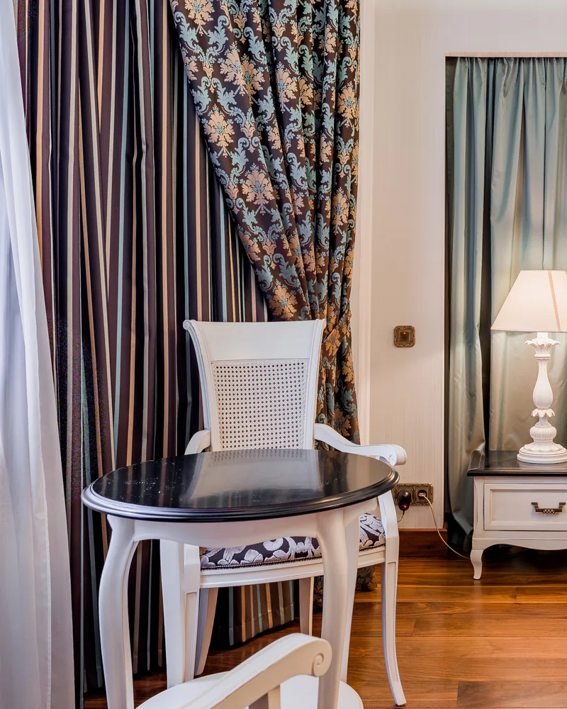 Decorative curtains framing a styled living room