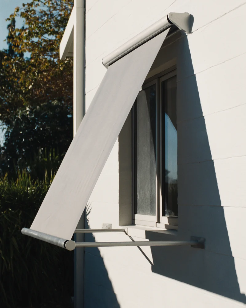 A fixed awning above a window