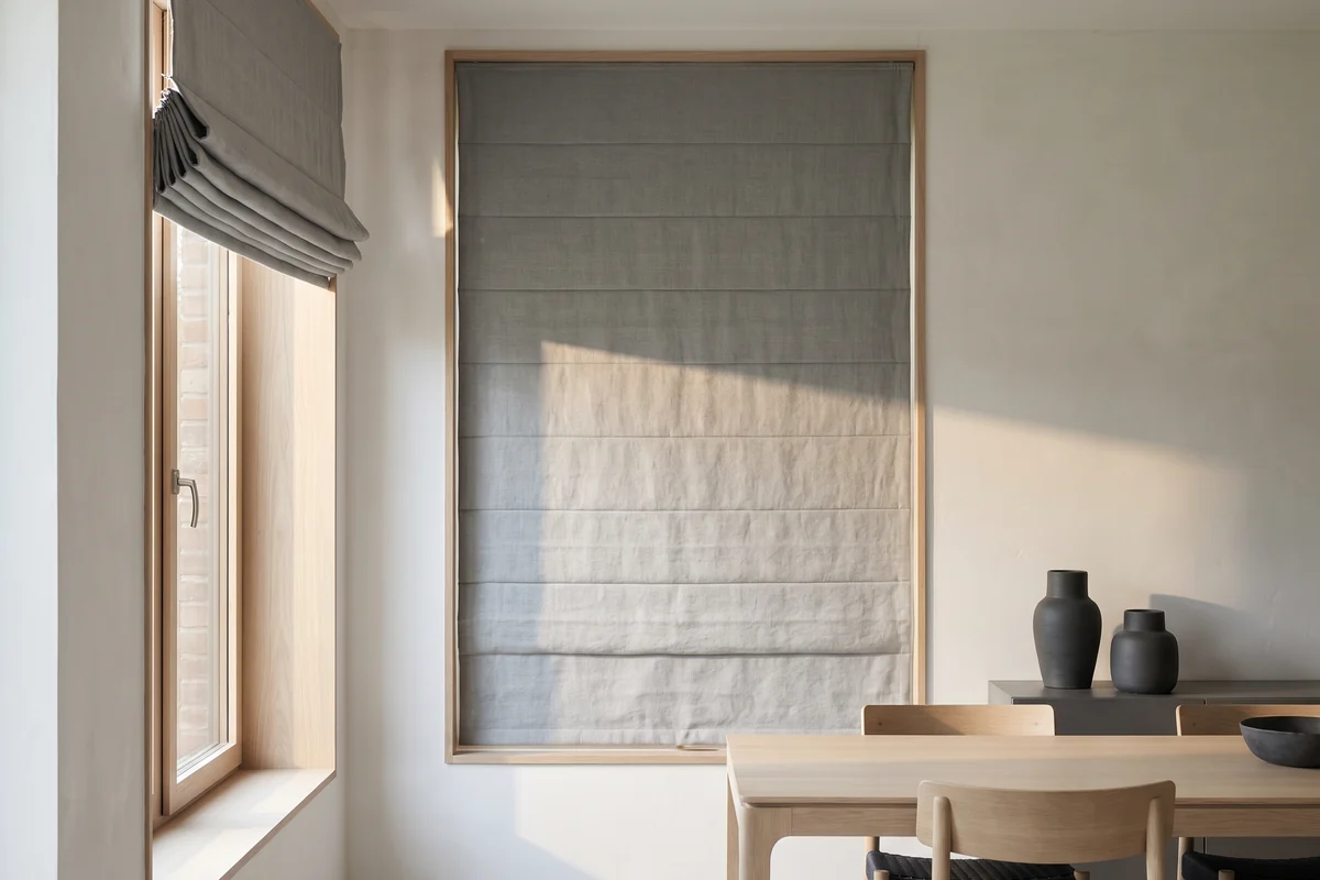 A roman blind drawn up into horizontal fabric folds