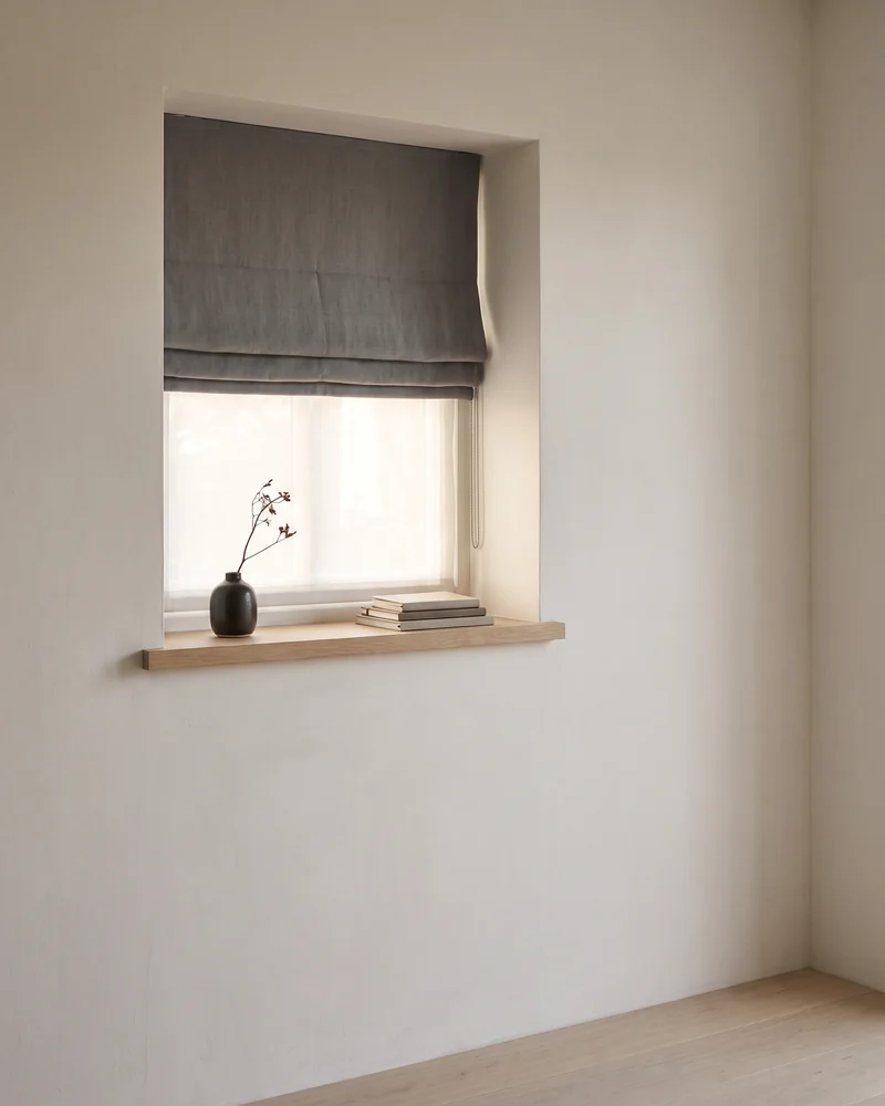 A Roman blind on a small window