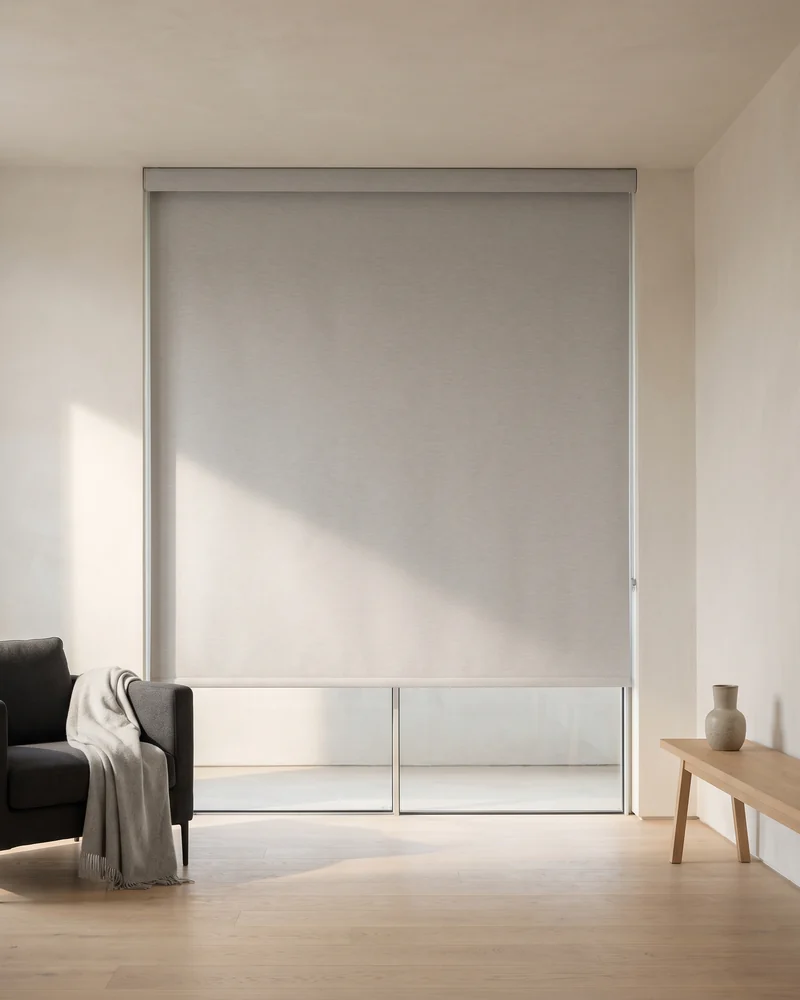 A single roller blind covering a wide span of glass