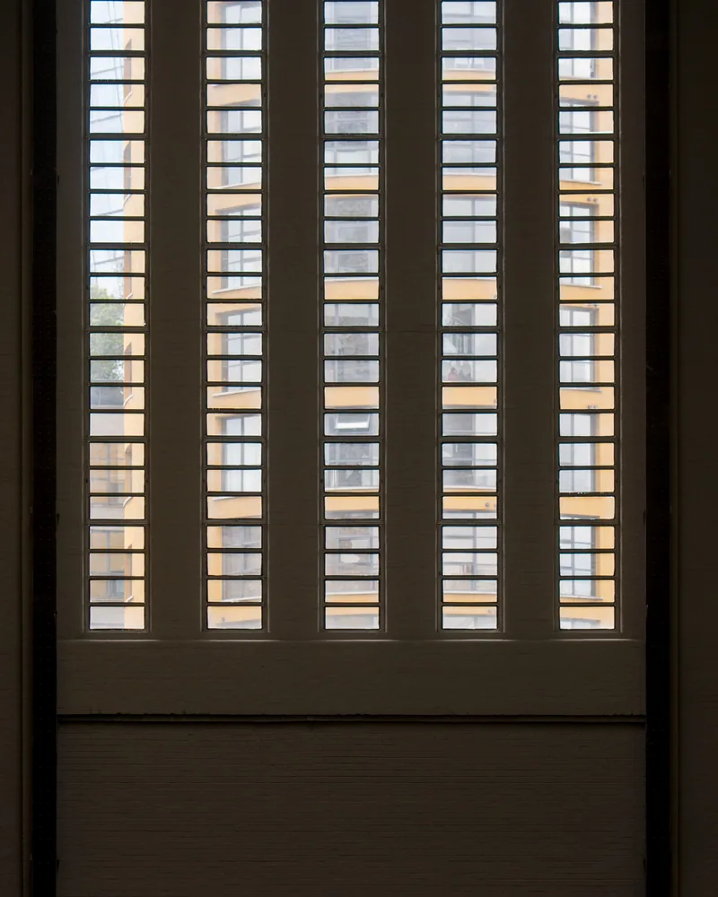 Tall shutter panels running the full height of a window