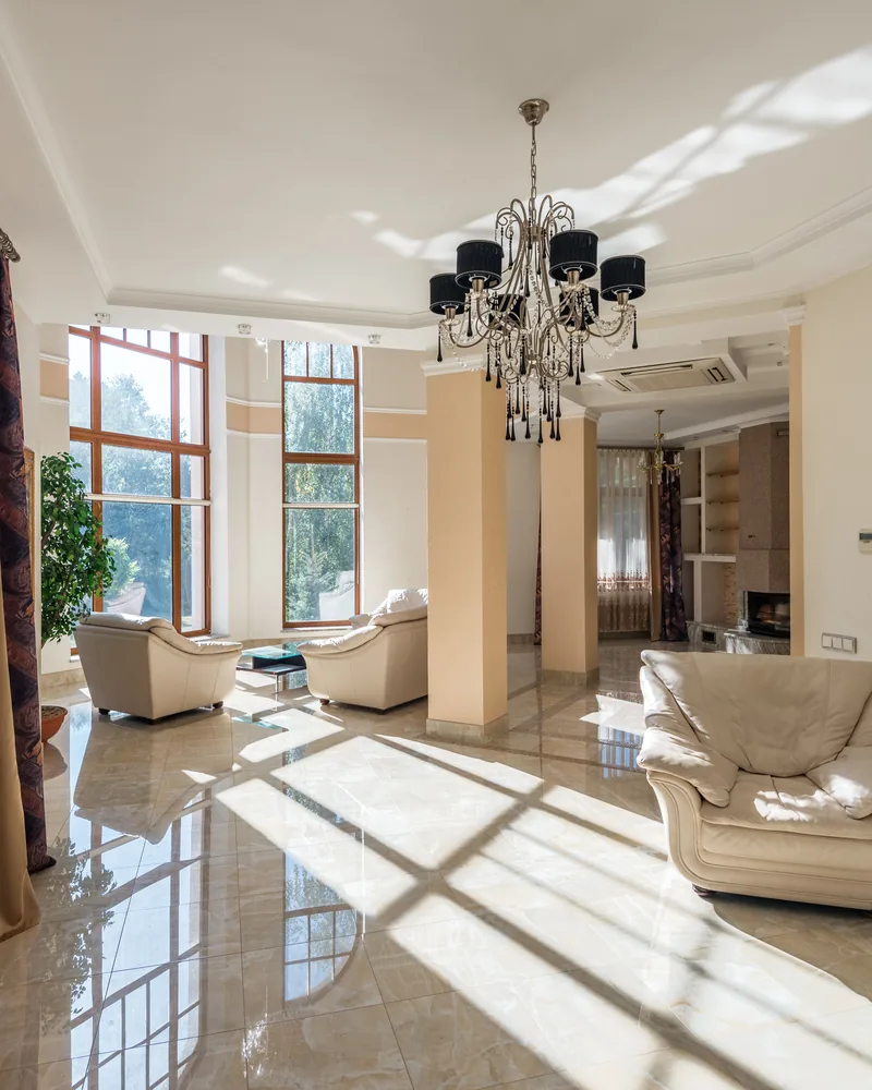 Long curtains hung to a high ceiling