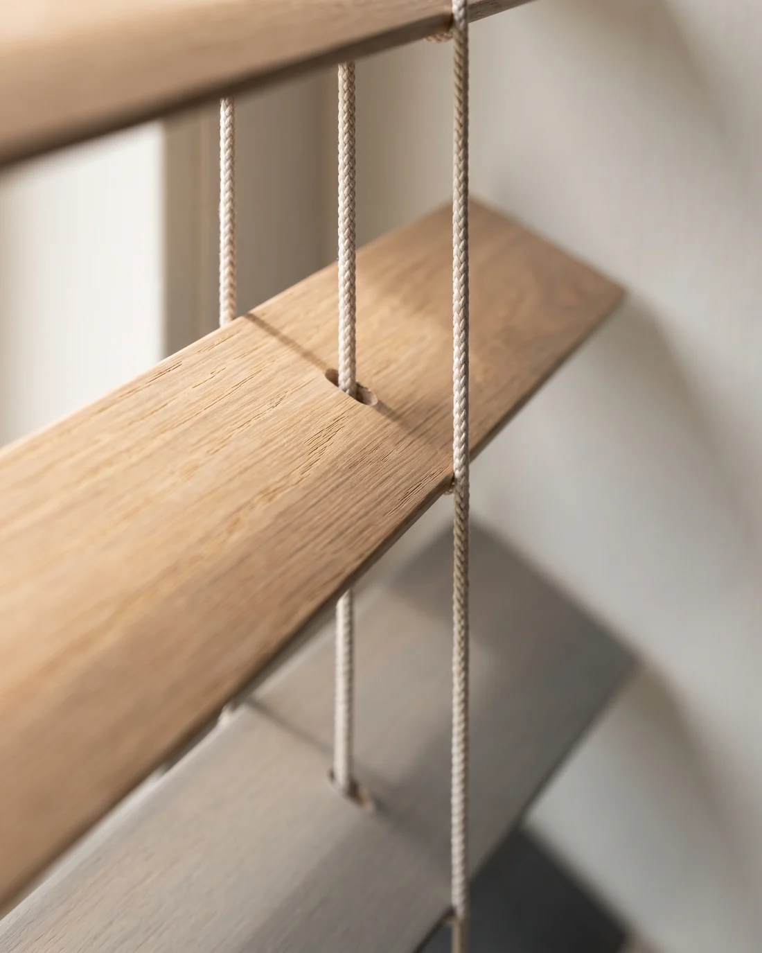 The grain and finish of a timber venetian slat in daylight