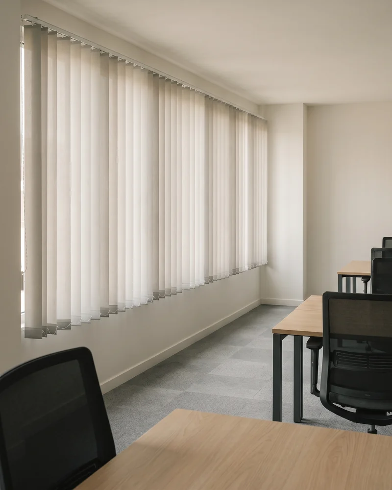 Vertical blinds fitted across a commercial office